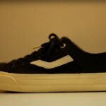 Ventela All Is Well black canvas sneaker with a white stripe and cream sole