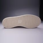 Cream outsole of the Ventela V-88 Low with a circular dot tread
