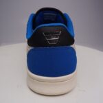 Back view of the Ventela V-88 Low with the chrome V logo on the heel